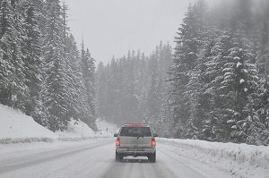 a car on road in the snow a car on road in the snow