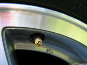 Close-up of a car tire valve stem