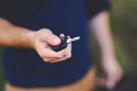 Hand Holding Car Keys