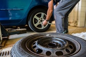 Spare Tire and Tire Change in Progress