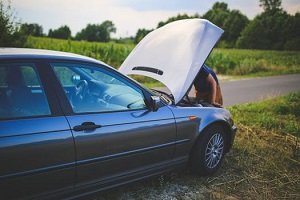 Vehicle with Open Hood on Roadside