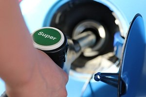 Refueling a Vehicle at a Gas Station Refueling a Vehicle at a Gas Station