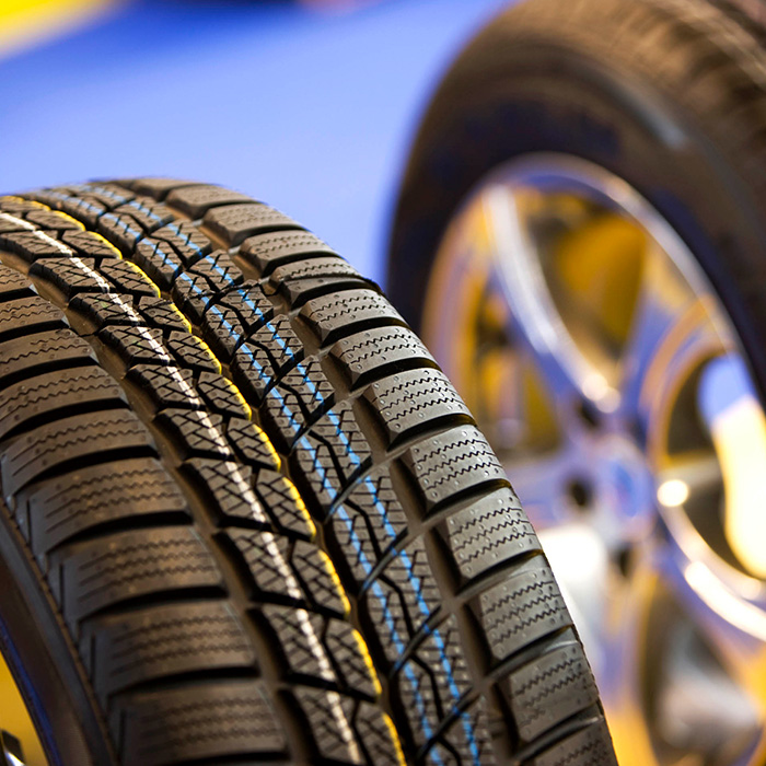 Winter studless tires for cars in shop
