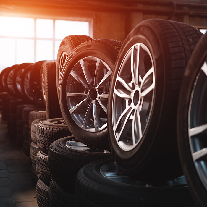 Modern warehouse with stack of car tires