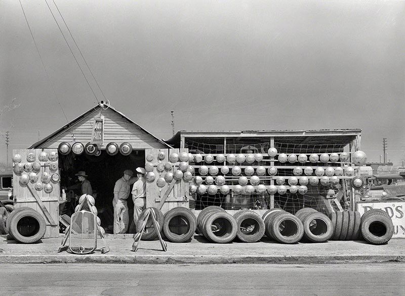 Black and white photo of a tire shop Black and white photo of a tire shop